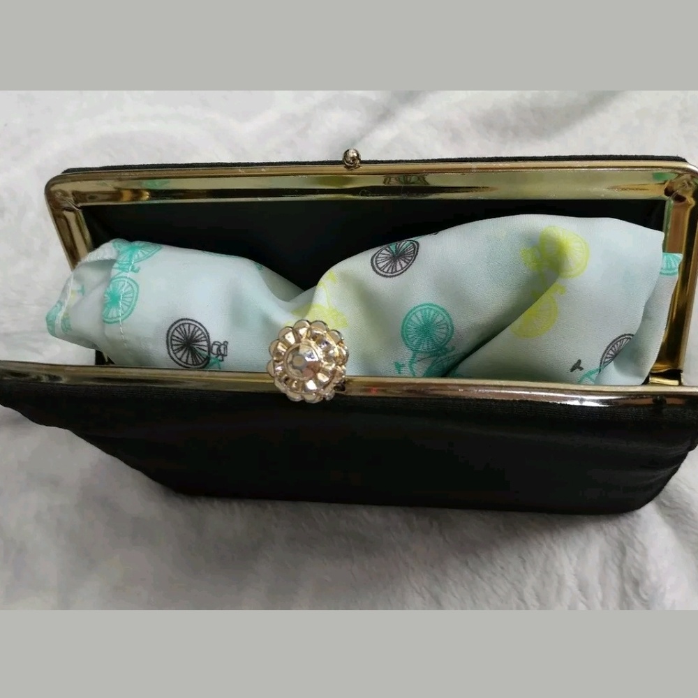 Black woman's clutch with a surprise inside.